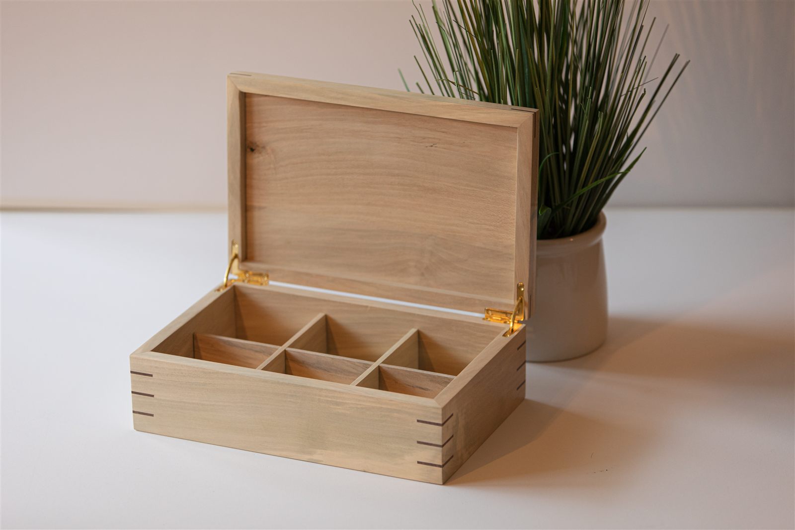 The holly bridal box, open, brass hinges visible
