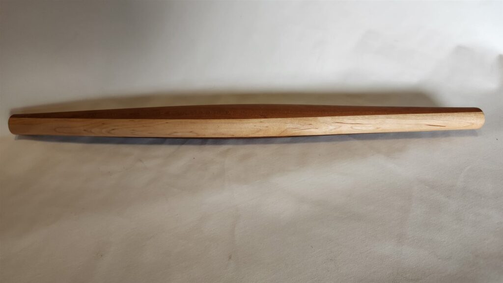 The two-tone taper, cherry and maple, full length